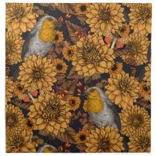 Robins in the autumn garden on black cloth napkin