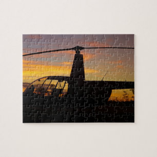Robinson R44 helicopter at sunset Jigsaw Puzzle