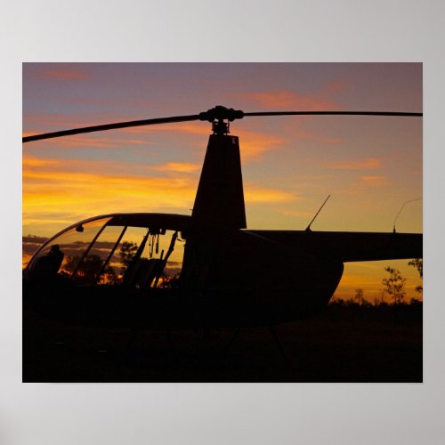 Robinson R44 helicopter at sunset Poster