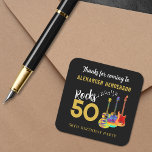 Rock 50th Birthday Party Thank You Personalized Square Sticker<br><div class="desc">Rock & Roll 50th Birthday Thank You Sticker personalized Psychedelic Guitars & Gold Typography Turn your milestone celebration into a show-stopping event with this rock and roll 50th birthday party thank you sticker. Featuring psychedelic electric guitars, acoustic guitars, and semi-acoustic guitars in vibrant rainbow colors, plus bold gold typography on...</div>
