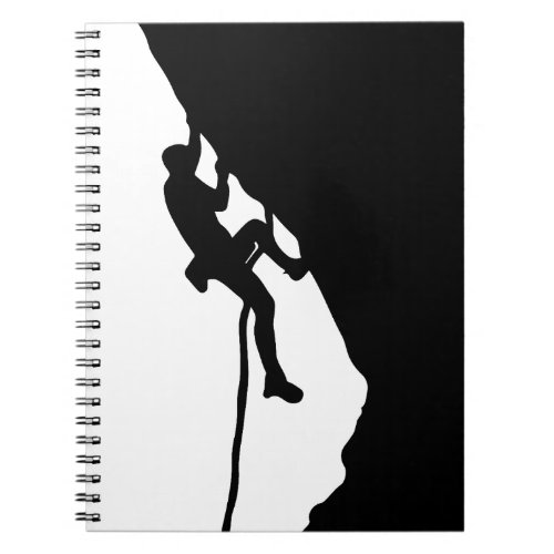 Rock climber conquers a sheer cliff  notebook