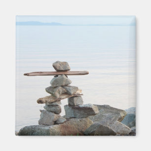 Rock stacking art by the beach. photo by Hao zhang Magnet