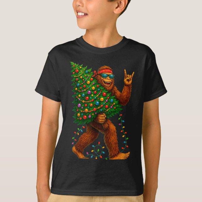 Rockin Christmas Bigfoot Carrying Tree Fun Xmas Ro T-Shirt (Front)