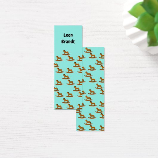 Rocking wooden horse pattern on blue bookmark (Desk)