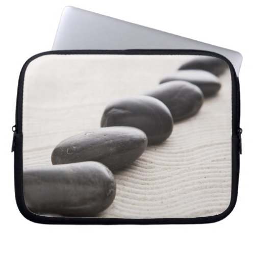 Rocks on sand laptop sleeve