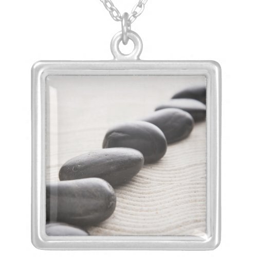 Rocks on sand silver plated necklace