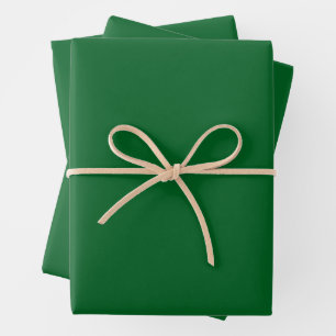 roll of solid dark green adhesive vinyl wrapping paper sheets