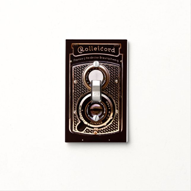 Rolleicord art deco camera light switch cover (In Situ)