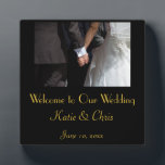 Romantic and Elegant Wedding Couple Holding Hands Plaque<br><div class="desc">Welcome to our wedding plaque. A romantic and elegant wedding photograph of a couple holding hands. The image focuses on the couples hands clasped together in love,  while wearing their fancy wedding attire. She in her wedding gown and he in his tux. Personalize with your own wedding details.</div>
