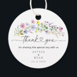 Romantic Boho Garden Wildflower Thank You Favor Tags<br><div class="desc">Add a heartfelt finishing touch to your wedding favors with these watercolor wildflower thank you tags. Featuring a spray of hand-painted blooms in pink, purple, yellow, and blue with elegant script that reads “thank you, ” this round tag is personalized with your names and wedding date. Perfect for attaching to...</div>