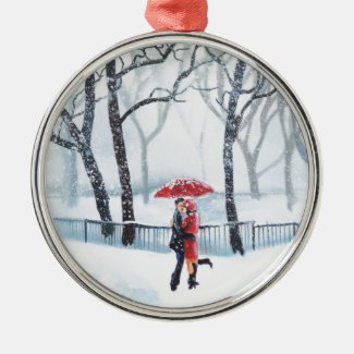 Romantic couple dancing in the snow red umbrella metal ornament