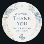 Romantic Dusty Blue Thank You Floral Wedding Classic Round Sticker<br><div class="desc">Romantic Dusty Blue Watercolor Floral Thank You Wedding Stickers features dusty blue celeste and delphinium flowers with eucalyptus greenery accented with butterflies. Add your custom text in elegant modern calligraphy script. Add to wedding favors, gift bags and more. More sizes and shapes available. Designed for you by Evco Studio www.zazzle.com/store/evcostudio...</div>