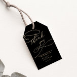 Romantic Gold Calligraphy | Black Wedding Favor Gift Tags<br><div class="desc">These romantic gold calligraphy black wedding favor gift tags are perfect for a simple wedding. The modern classic design features fancy swirls and whimsical flourishes with gorgeous elegant hand lettered faux champagne gold foil typography. Personalize the labels with your names and the date. Change the wording to suit any event:...</div>