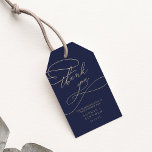 Romantic Gold Calligraphy | Navy Wedding Favor Gift Tags<br><div class="desc">These romantic gold calligraphy navy wedding favor gift tags are perfect for a simple wedding. The modern classic design features fancy swirls and whimsical flourishes with gorgeous elegant hand lettered faux champagne gold foil typography. Personalize the labels with your names and the date. Change the wording to suit any event:...</div>