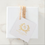 Romantic Gold Monogram Crest Wedding Foil Favor Tags<br><div class="desc">Celebrate your wedding in style with these charming real gold foil favor tags. The design features a beautiful monogram set within a delicate wreath crest, creating a sophisticated and romantic appearance. These tags are ideal for adding a personalized touch to your wedding favors, whether it's candies, small gifts, or party...</div>