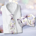 Romantic Lavender Purple Iris Floral Wedding  Neck Tie<br><div class="desc">Iris Dreams: A Romantic Wedding Tie for the Groom Let your love story bloom with this enchanting wedding tie! This tie features a cascade of soft lavender purple irises, along with delicate and a sprinkling of white wildflowers, all set against a minimalist white background. It's the perfect way to add...</div>