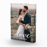 Romantic Love Script Wedding Photo Newlyweds Block<br><div class="desc">Eternal Embrace: Romantic Love Script Wedding Photo Frame for Newlyweds Capture the magic of a wedding day with the "Eternal Embrace" Photo Frame, a memento that epitomizes the unity and affection shared between two souls. 💕 Chic Love Script: The word "Love" is elegantly scripted across the photo, embodying the essence...</div>