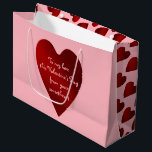 Romantic personalized heart large gift bag<br><div class="desc">A gift bag for your Valentine's Day gift wrapping needs in pink with red hearts printed on it. Great for Valentine's Day or any day. A cute way to show your love.</div>