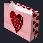 Romantic personalized heart large gift bag<br><div class="desc">A gift bag for your Valentine's Day gift wrapping needs in pink with red hearts printed on it. Great for Valentine's Day or any day. A cute way to show your love.</div>
