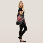 Romantic Pink Floral Bouquet Mother of the Bride Tote Bag<br><div class="desc">Romantic and moody, this tote bag is the perfect gift for members of your bridal party. The floral design features a natural bouquet of blush pink roses and stunning ranunculus with dark green leaves in a luxurious arrangement on a black watercolor wash. You can personalize with a name or bridal...</div>
