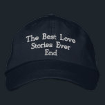 Romantic Quote "The best love stories never end,"  Embroidered Baseball Cap<br><div class="desc">This navy cotton cap features the romantic quote "The best love stories never end, " elegantly embroidered to capture its timeless sentiment. The adjustable strap ensures a comfortable fit for all sizes, making it a versatile choice. Crafted from durable cotton, this cap combines style with a meaningful message, making it...</div>