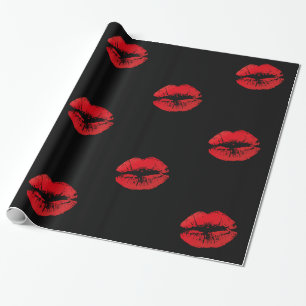 Romantic red lips kisses on black wrapping paper