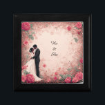 Romantic Wedding Couple Gift Box<br><div class="desc">A beautifully illustrated romantic wedding scene featuring a couple embracing,  surrounded by a detailed floral border in a vintage design. Evoking love,  elegance,  and timeless charm,  ideal for wedding themes or romantic contexts.</div>