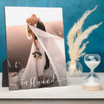 Romantic Wedding Photo Keepsake Plaque<br><div class="desc">Your favorite wedding photo becomes a beautiful reminder of your wedding with this romantic keepsake plaque. Designed in a modern and elegant style with soft script lettering and neutral tones. Replace this sample photo with your favorite wedding photo, and personalize your photo with your name monogram with your last name...</div>