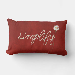 rope simplify text on red lumbar pillow
