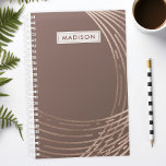 Rose Gold and Mauve Abstract Trendy Personalized Planner<br><div class="desc">Stay organized in style with this rose gold and mauve abstract trendy personalized planner. Perfect for women who love chic and contemporary designs, this planner combines elegance with functionality. The modern abstract pattern and luxurious rose gold accents add a touch of sophistication to your daily planning. Personalize it with your...</div>