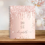 Rose gold blush glitter drips monogram name 2025 planner<br><div class="desc">A rose gold background with elegant blush faux glitter drips, paint dripping look. Personalize and add a year (upside down) and add a name. The name is written in dark rose gold with a large modern hand lettered style script with swashes. Perfect for school, work or organizing your personal/family life....</div>