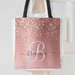 Rose Gold Brushed Metal Glitter Monogram Name Tote<br><div class="desc">Easily personalize this trendy chic tote bag design featuring pretty rose gold sparkling glitter on a rose gold brushed metallic background.</div>