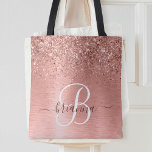 Rose Gold Brushed Metal Glitter Monogram Name Tote Bag<br><div class="desc">Easily personalize this trendy chic tote bag design featuring pretty rose gold sparkling glitter on a rose gold brushed metallic background.</div>