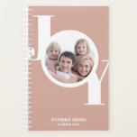 Rose Gold Custom Photo 2023 Planner<br><div class="desc">This modern and stylish 2023 Planner features the word JOY in bold typography on a blush pink,  rose gold background.
Easily customizable with your photo,  year,  and name.</div>