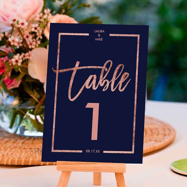 Rose gold frame script navy blue table number (Creator Uploaded)