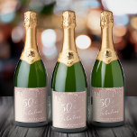 Rose Gold Glitter 50th Birthday Party Sparkling Wine Label<br><div class="desc">Celebrate your fiftieth birthday in style with these custom wine labels. "50 & Fabulous" is written in an elegant white script against a rose gold background,  with rose gold faux glitter dripping from the top. Personalize with your name and the party date.</div>