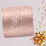 Rose Gold Glitter 50th Birthday Party Square Paper Coaster<br><div class="desc">Chic custom 50th birthday party coaster featuring "50 & Fabulous" in a calligraphy script,  a rose gold faux foil background and dripping rose gold faux glitter. Perfect for table decor that guests can take home as a souvenir party favor.</div>