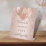 Rose gold glitter blush birthday party welcome pedestal sign<br><div class="desc">Rose gold,  blush background. Decorated with faux glitter drips,  sparkles and balloons. With the text: Welcome to - birthday party.  Personalize and add a name.</div>