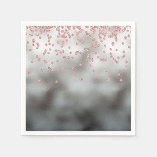 Rose gold glitter confetti on silver paper napkins