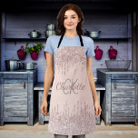 Rose gold glitter drips girly monogram name apron<br><div class="desc">A rose gold background decorated with rose gold,  pink sparkling faux glitter drips,  paint dripping look. Personalize and add your monogram initials and name.</div>
