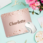 Rose gold glitter monogram name  mouse pad<br><div class="desc">A feminine rose gold faux metallic looking background. Decorated with faux glitter dust. Personalize and add your name.  The name is writtten with large,  bold letters.</div>
