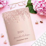 Rose gold glitter pink monogram 2025 planner<br><div class="desc">A faux rose gold background with elegant rose gold and pink faux glitter drips, paint dripping look. Template for a year. Personalize and add a name and a title. The name is written in dark rose gold with a modern hand lettered style script. Perfect for business, school, work, diary or...</div>