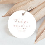 Rose Gold Minimalist Thank You Wedding Favor   Classic Round Sticker<br><div class="desc">This rose gold minimalist thank you wedding favor classic round sticker is perfect for a modern wedding. The simple and elegant design features classic and fancy script typography in rose gold. Make the sticker labels your own by including your names, the event (if applicable), and the date. These stickers can...</div>