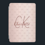 Rose gold monogram initials pink modern iPad mini cover<br><div class="desc">Personalize and add your name and monogram letters,  initials.  The monogram initials as a pattern on the background.   A girly and feminine rose gold,  pink gradient background color.  Rose gold colored letters. The name is written with a hand lettered style script.</div>