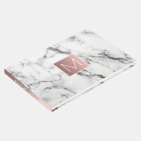 rose gold monogram on white marble look guest book