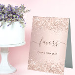 Rose gold party favor  table tent sign<br><div class="desc">A rose gold background with confetti. Favors is written with a modern hand lettered style script with swashes.</div>