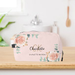 Rose gold pink floral greenery name monogram dopp kit<br><div class="desc">A rose gold,  pink colored background,  black and golden text. Decorated with watercolored rose gold roses,  eucalyptus greenery and golden sprigs. 
Personalize and add your first name,  monogram initials and full name.</div>