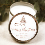 Rose Gold Ribbon Tree Merry Christmas Script Classic Round Sticker<br><div class="desc">This modern holiday sticker features a rose gold ribbon Christmas tree above the words "Merry Christmas" in stylish rose gold calligraphy script. Personalize it with your family's name in serif font.</div>