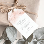 Rose Gold Watercolor Wedding Welcome Gift Tags<br><div class="desc">These rose gold watercolor wedding welcome gift tags are perfect for an elegant wedding. The whimsical design features neutral blush pink watercolor with beautiful faux rose gold glitter. Personalize the tags with the location of your wedding, a short welcome note, your names, and wedding date. These tags are perfect for...</div>