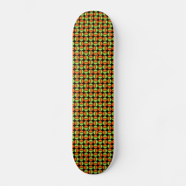 Rotating Circles - Green and Orange on Black Skateboard Deck (Front)